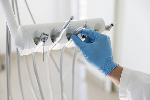 Professional Tooth Extraction technician working in Wakarusa, IN
